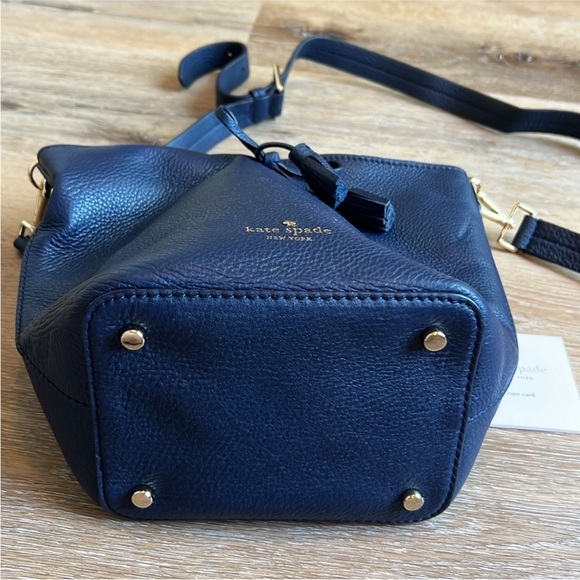 Kate Spade mini bucket bag. Never used. Missing tags but has care card. - Picture 8 of 11
